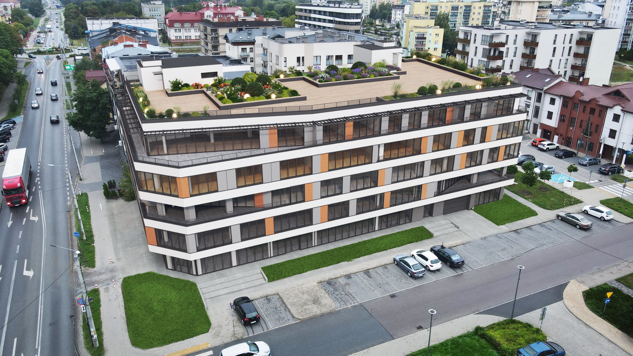 Wizualizacja zewnętrzna nowoczesnego budynku biurowego z zielonym dachem, widok z góry na parking i ulicę z ruchem.