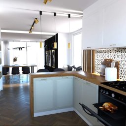 Autre Atelier - Wnętrze kuchni z otwartą przestrzenią jadalną, białe szafki z drewnianym blatem, dekoracyjna mozaika nad blatem, pieczony kurczak w piekarniku, parkiet w jodełkę na podłodze, minimalistyczne lampy...