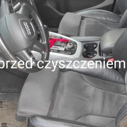 CZYSTY DOM I SAMOCHÓD - MARCIN KWAPISZ - Wnętrze samochodu Audi z widocznymi, brudnymi fotelami skórzano-zamszowymi i konsolą środkową przed czyszczeniem.