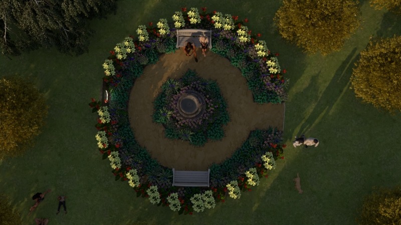 Widok z góry na okrągły ogród z fontanną, ścieżkami, ławkami i kwiatami. Dwie osoby siedzą na ławce. Na trawie leżą ludzie i biegają zwierzęta.