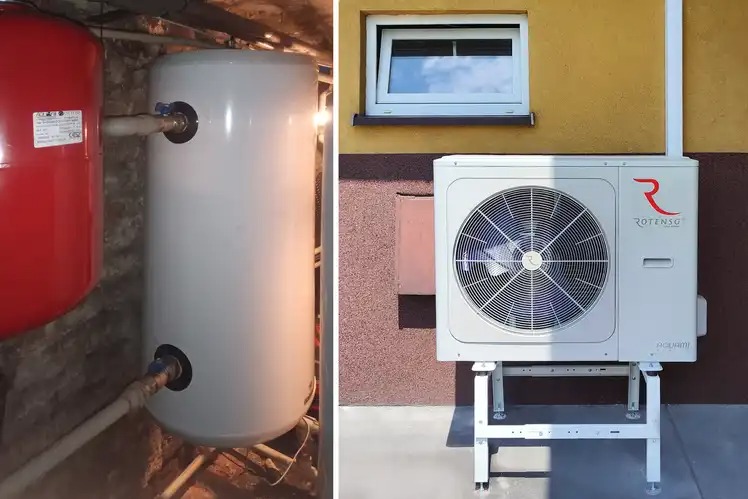 Zestaw instalacyjny: czerwony zbiornik ciśnieniowy i biały zasobnik w piwnicy obok zewnętrznej jednostki z wentylatorem na metalowym stelażu przy żółtej ścianie z oknem.