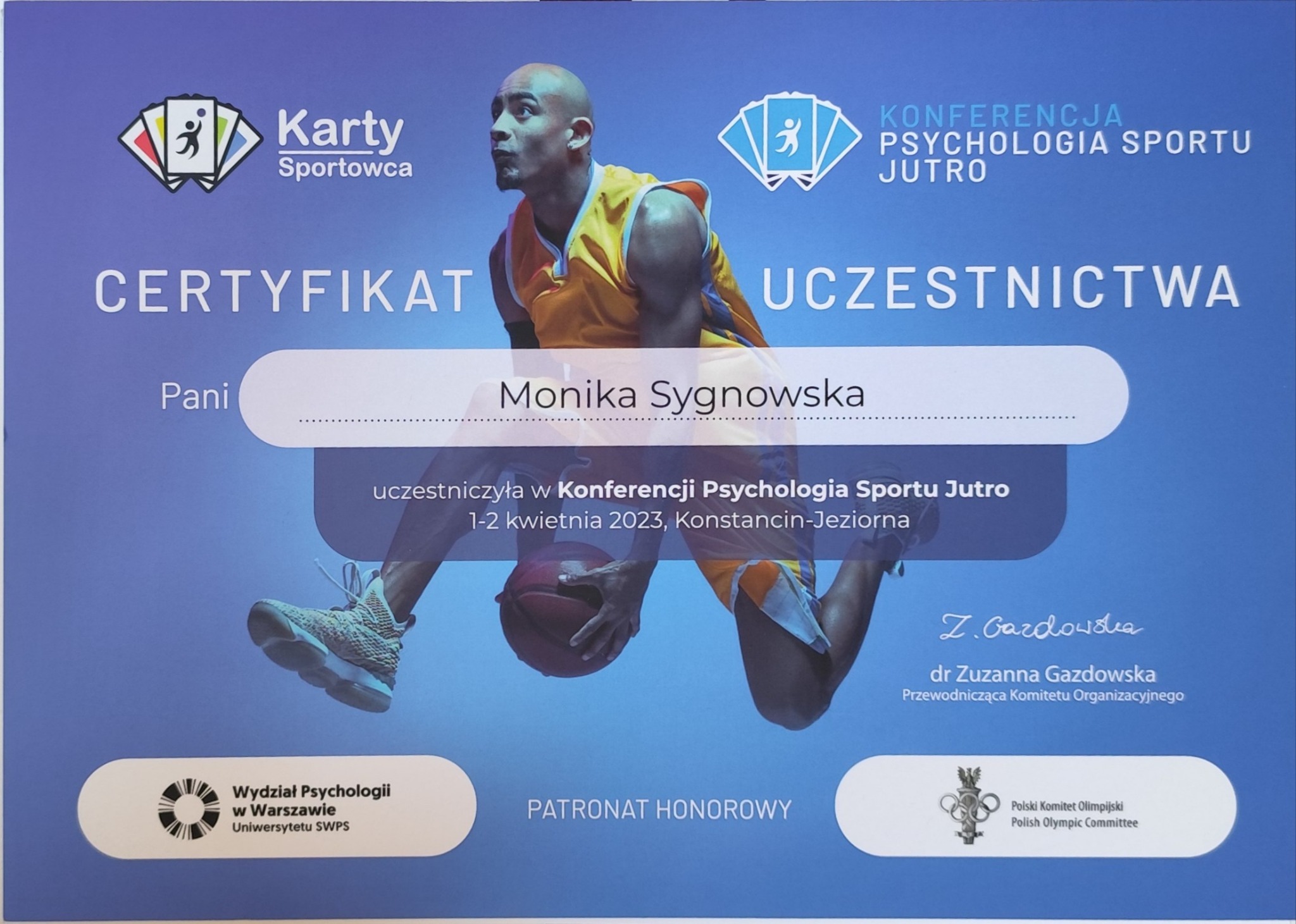 Certyfikat uczestnictwa w Konferencji Psychologia Sportu Jutro, z sylwetką koszykarza w tle i logotypami organizatorów.