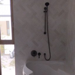 Yurii Drohomyretskyi KUB - Gładzie Bezpyłowe Warszawa