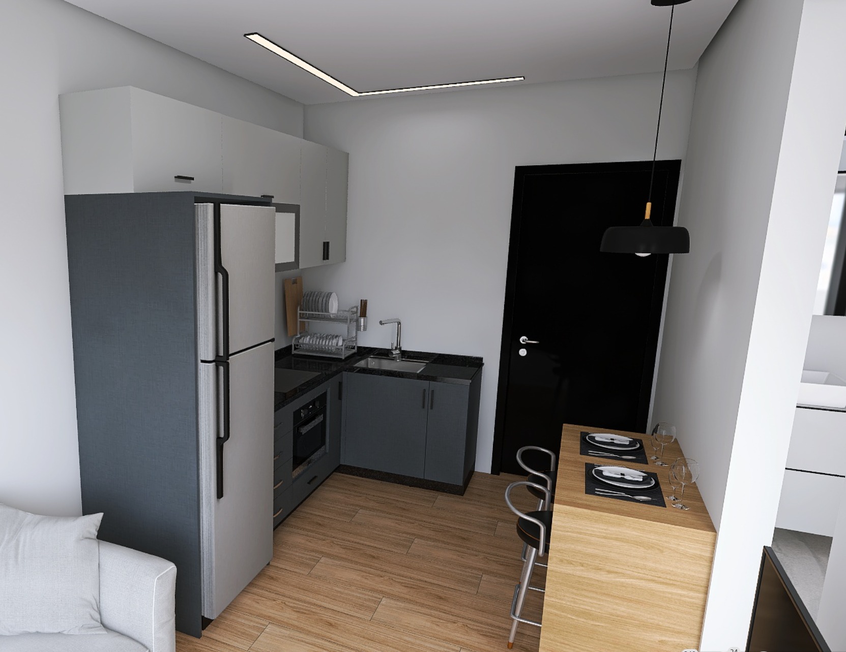 Wizualizacja małej kuchni z szarymi szafkami, czarnym blatem i sprzętem AGD w zabudowie, uzupełniona o drewniany stół barowy z dwoma krzesłami.