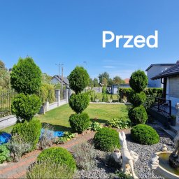 Power Garden - Ogród przydomowy z równo przystrzyżonymi krzewami i drzewami, fontanna z rzeźbą kobiety, trawnik, kostka brukowa i ogrodzenie.