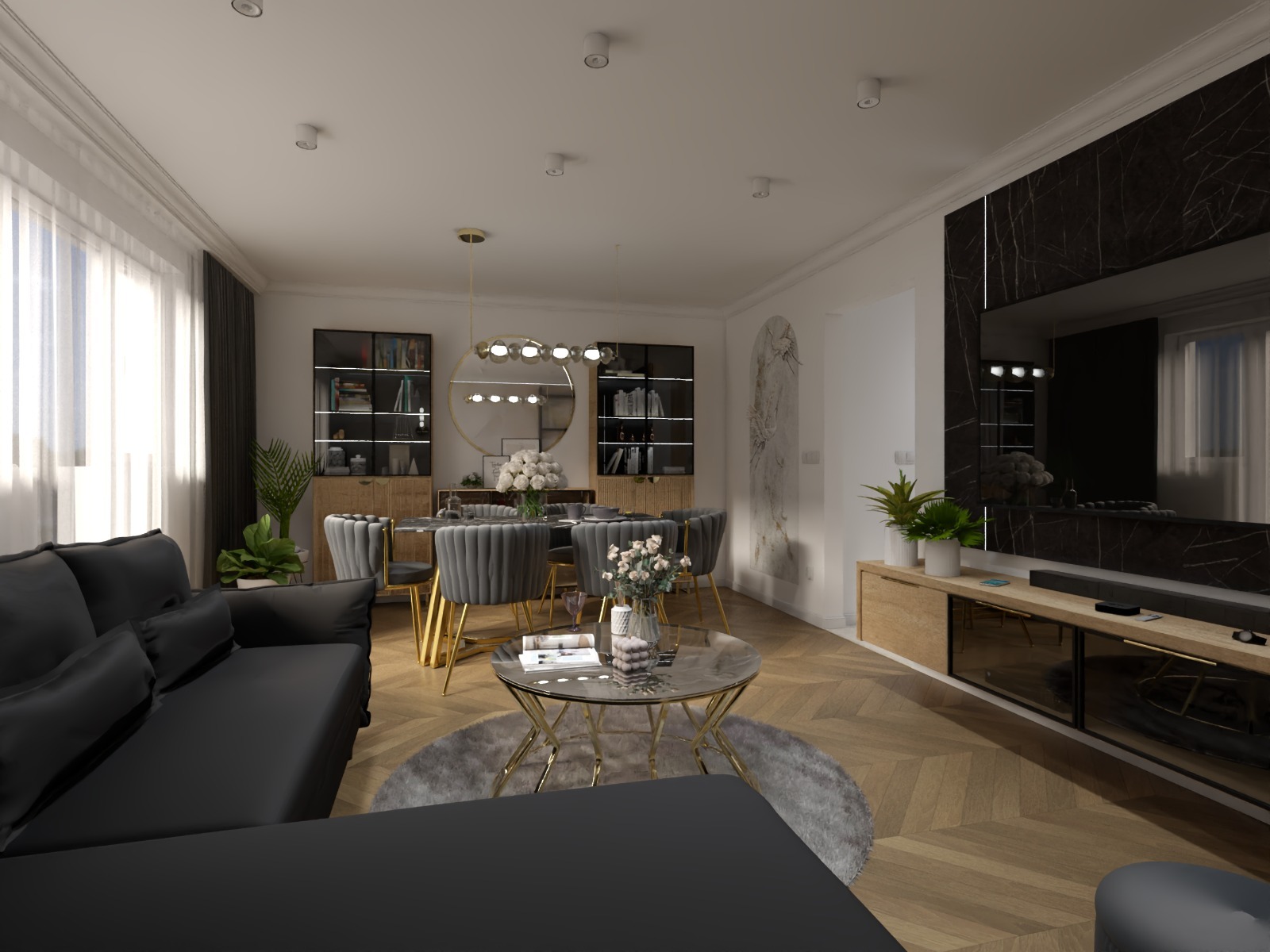 Elegancki salon z czarną sofą, okrągłym stolikiem kawowym i jadalnią z szarymi krzesłami na złotych nogach. Parkiet w jodełkę, nowoczesne oświetlenie i dekoracje.