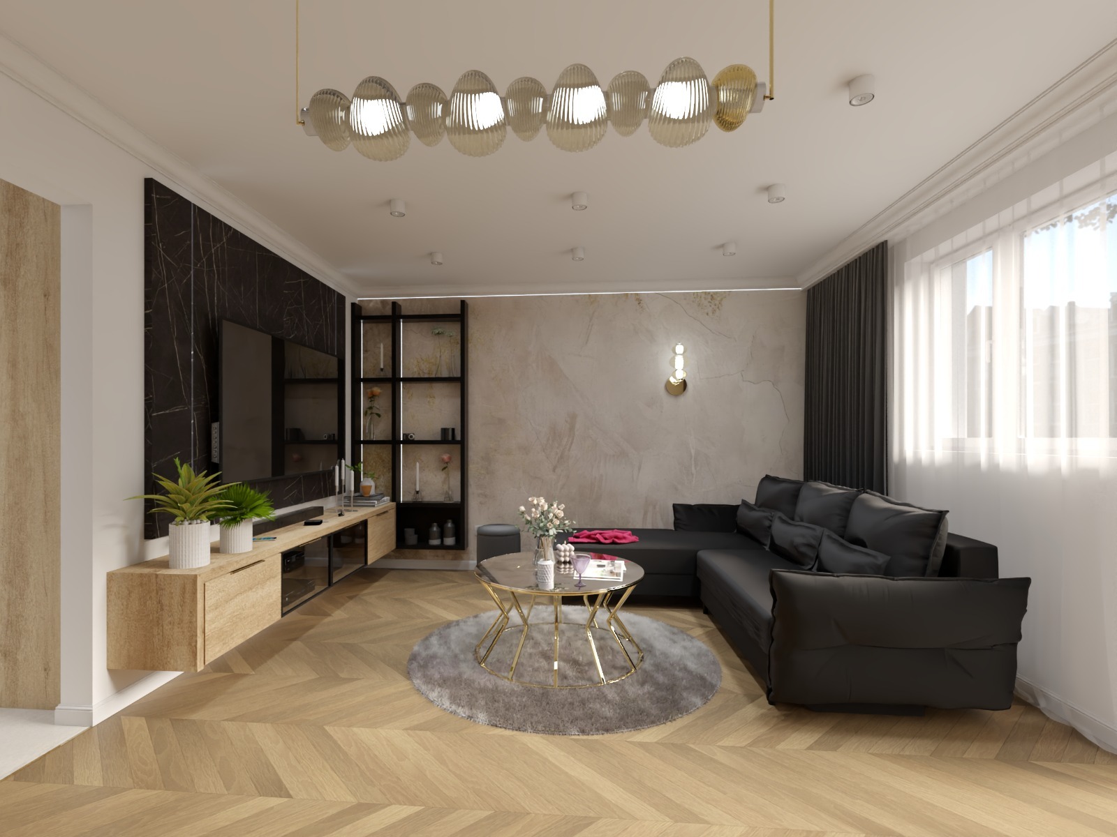 Salon z czarną sofą narożną, parkietem w jodełkę i marmurową ścianą za telewizorem. Nad stolikiem kawowym wisi nowoczesny, szklany żyrandol.