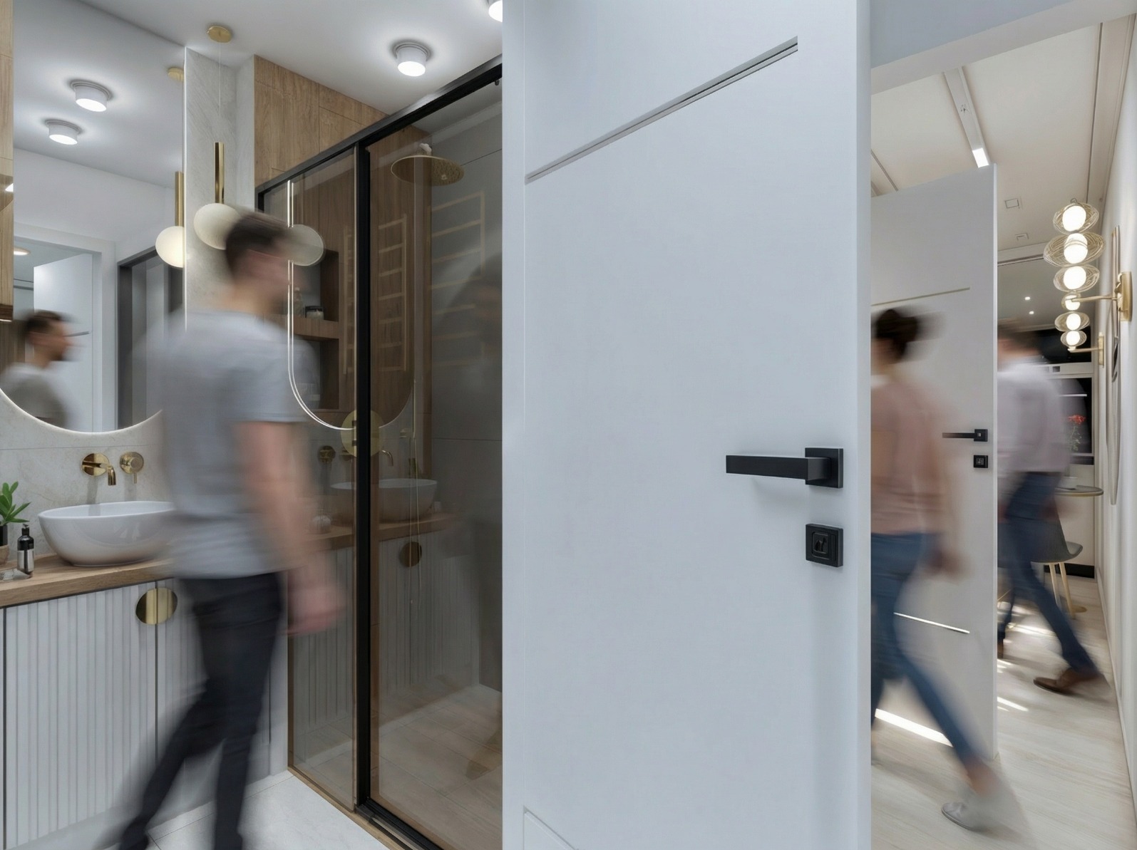 Nowoczesna łazienka z kabiną prysznicową za szklaną ścianą, umywalką na szafce z ryflowanym frontem i okrągłym lustrem. Widoczne osoby w ruchu, białe drzwi z czarną klamką.