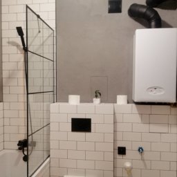 G-HEAT INSTALACJE HYDRAULICZNE - Przeniesienie kotła gazowego i rozdzielacza C.O. na prostopadłą ścianę. Zdjęcie po wykończeniu.