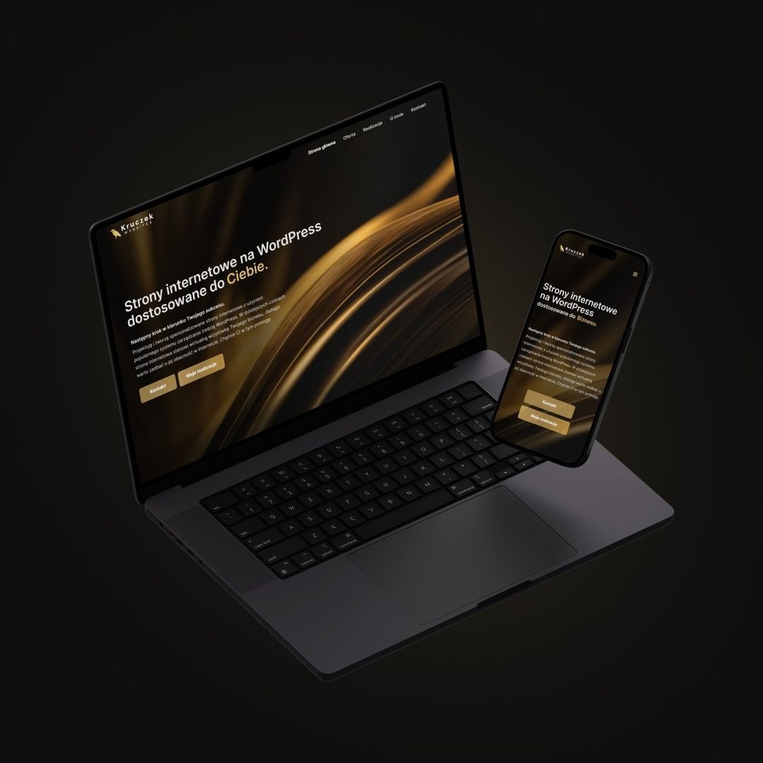 Laptop i smartfon z wyświetloną stroną internetową na WordPress z motywem graficznym w odcieniach złota i czerni, prezentacja responsywności, logo firmy Kruczek Websites w lewym górnym rogu.