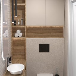 Julija Leszczanok - Nowoczesna łazienka z wiszącą miską WC, umywalką nablatową na drewnianym blacie, podświetlanym lustrem owalnym, drewnianymi półkami z ręcznikami i beżowymi szafkami wiszącymi.