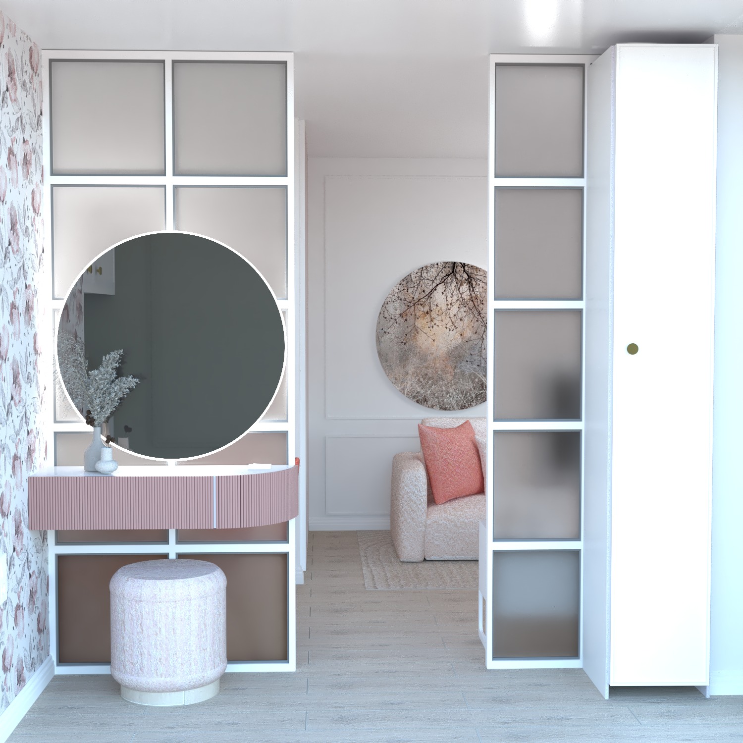 Nowoczesna toaletka z okrągłym lustrem i tapicerowanym pufem w pastelowych odcieniach różu i bieli, na tle ściany w kwiatowe wzory i białej szafy z przeszkleniami.