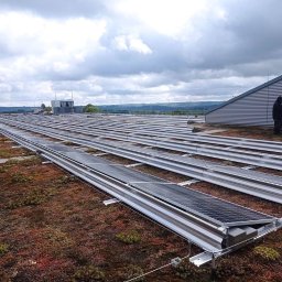 MARIUSZ KOWALCZYK CREON GROUP - Belgia. Instalacja 150 kW na zielonym dachu budynku mieszkalnego