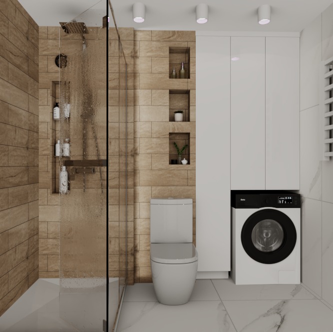 Nowoczesna łazienka z kabiną prysznicową typu walk-in, toaletą, pralką w zabudowie i niszami w ścianie wyłożonej beżowymi płytkami. Minimalistyczny design, białe fronty szafek.