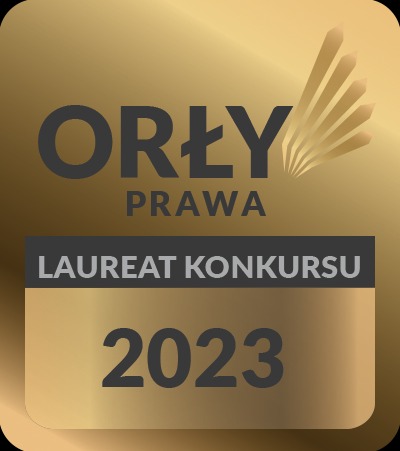 Złoty emblemat 'Orły Prawa', z napisem 'Laureat Konkursu 2023' i symbolem stylizowanych piór.