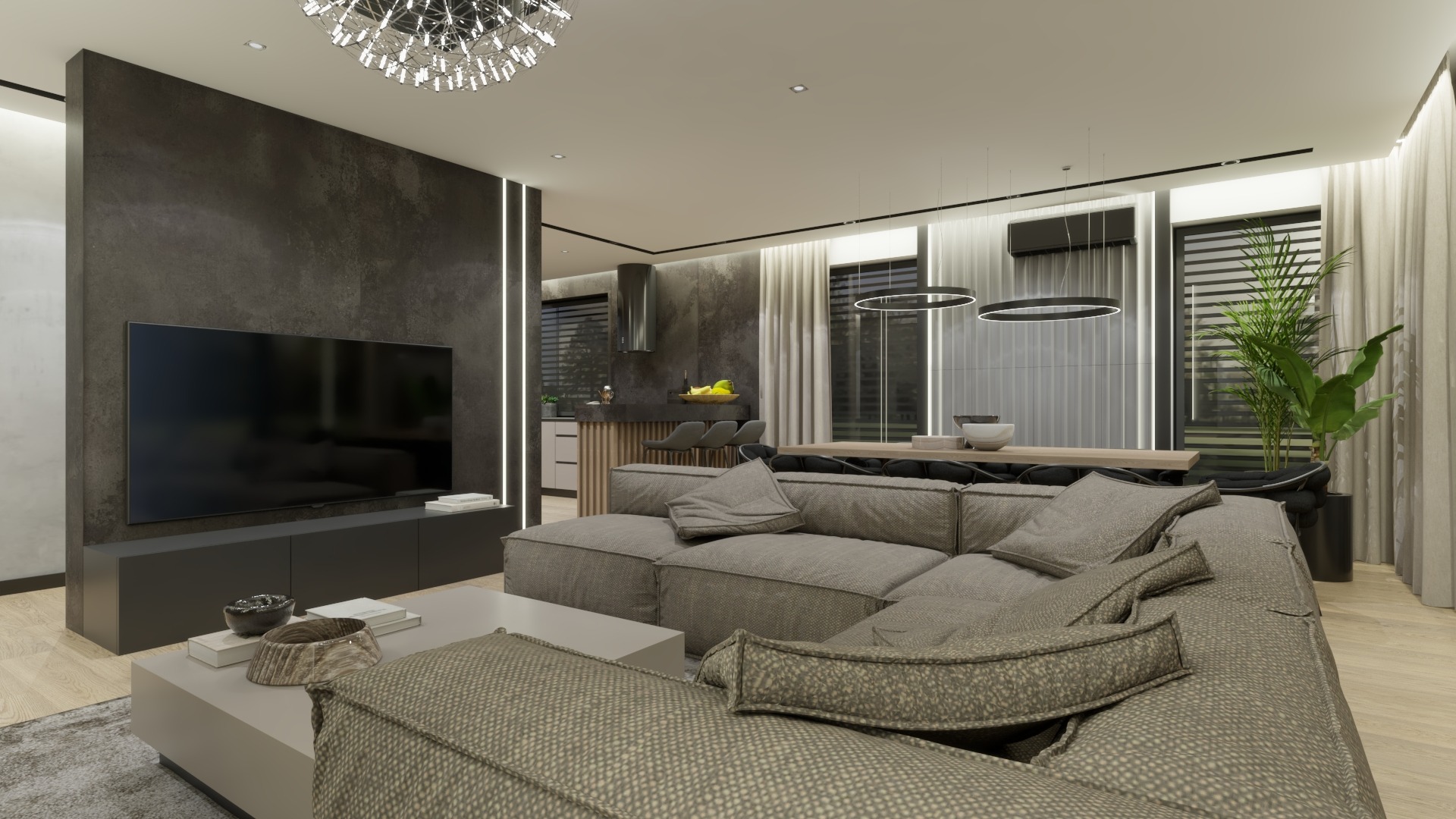 Nowoczesny salon z szarą, modułową sofą narożną, drewnianym stołem jadalnym z czarnymi krzesłami i wyspą kuchenną z hokerami, oświetlony kulistym żyrandolem i lampami wiszącymi, z widoczną rośliną...