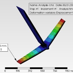 Night Sky Yachts Paweł Wesołowski - Symulacja komputerowa naprężeń na elemencie konstrukcyjnym w kształcie litery T, z kolorową skalą odzwierciedlającą wartości odkształceń w milimetrach, maksymalne odkształcenie 23.46 mm w węźle 21,...