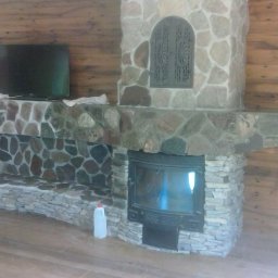 Wojciech Rocławski - kominek zabudowa ,okładzina kamień polny