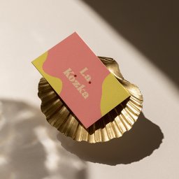 Projekt wizytówki dla sklepu z plakatami La. Kózka