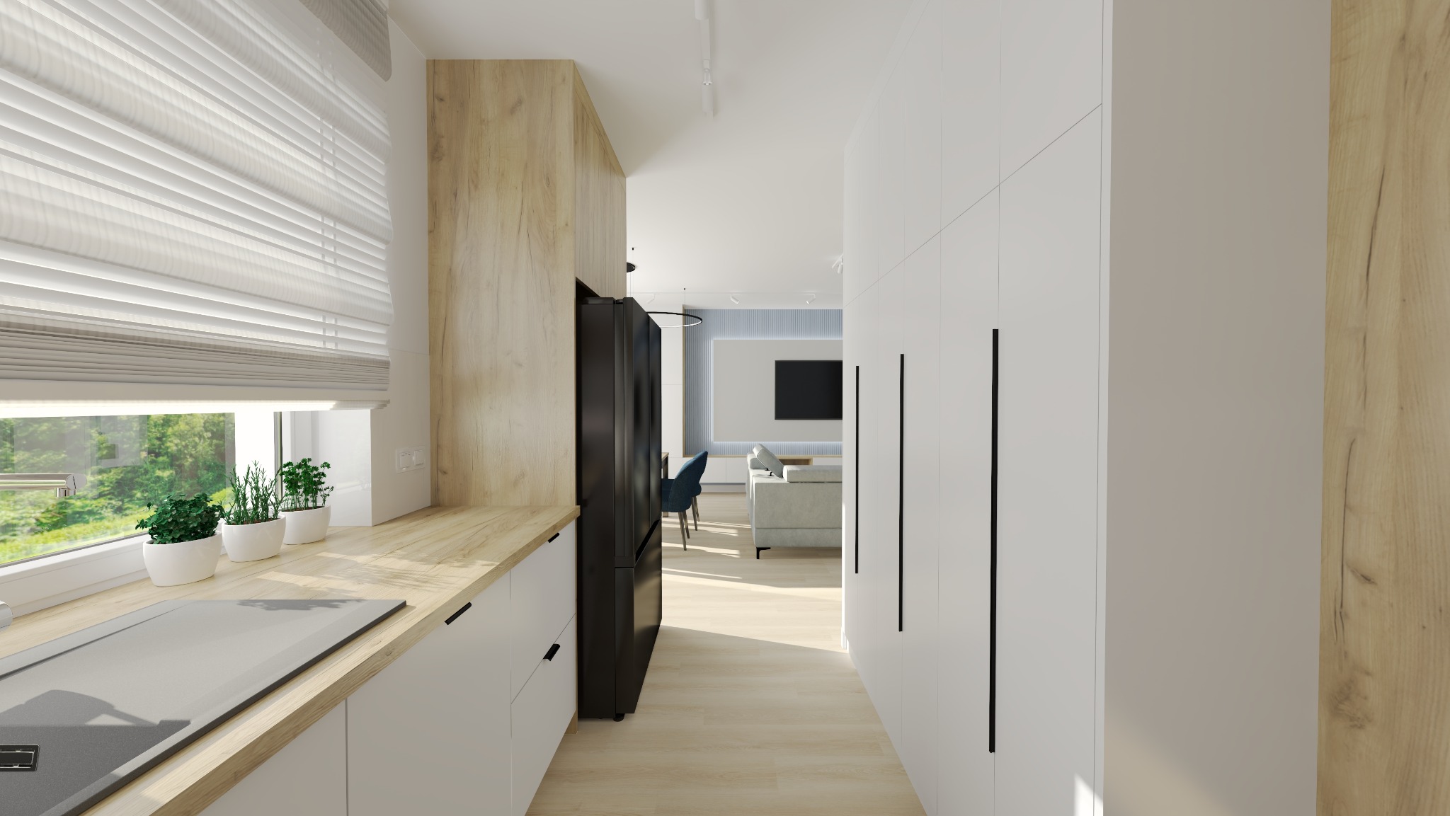 Nowoczesna kuchnia z drewnianym blatem, białymi szafkami i widokiem na salon w tle. Minimalistyczny design, rolety w oknie i doniczki z ziołami dodają uroku.