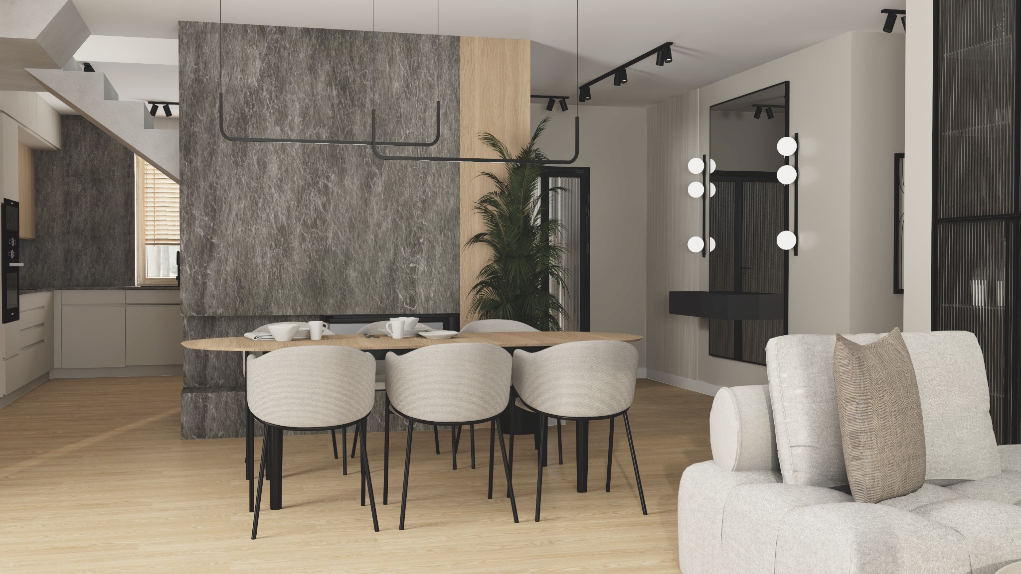 Nowoczesna jadalnia z owalnym stołem, krzesłami tapicerowanymi w jasnym odcieniu, marmurową ścianą z kominkiem i minimalistyczną lampą wiszącą. W tle widoczna kuchnia, schody i wysoka roślina...