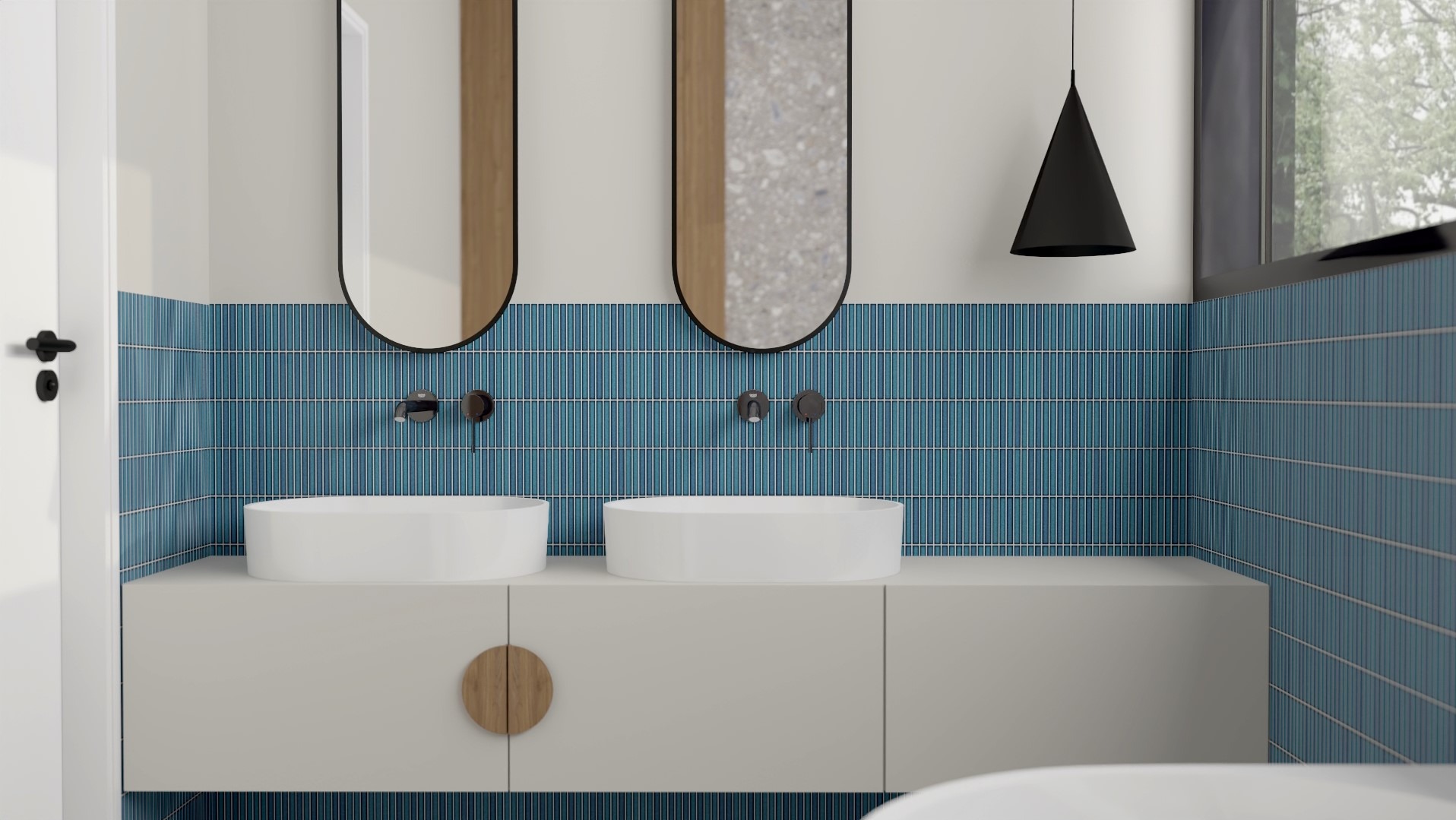 Nowoczesna łazienka z dwoma umywalkami nablatowymi, niebieskimi płytkami w pionowy wzór, okrągłymi lustrami z czarną obwódką i drewnianymi akcentami na szafce pod umywalką.