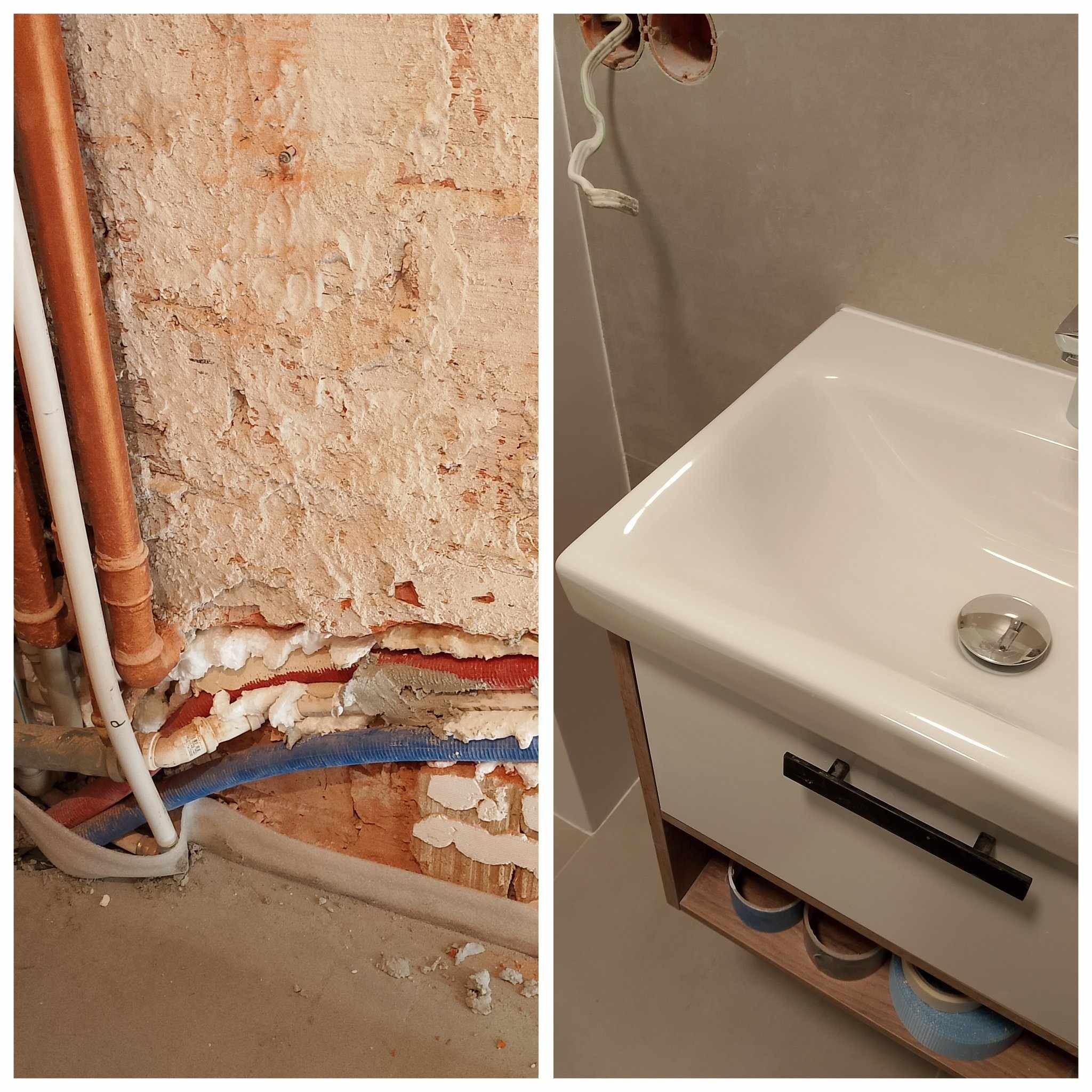Fragment ściany z odsłoniętymi rurami i instalacją, zabezpieczonymi pianką montażową, oraz umywalka z szafką w nowej łazience z szarą płytką na ścianie.