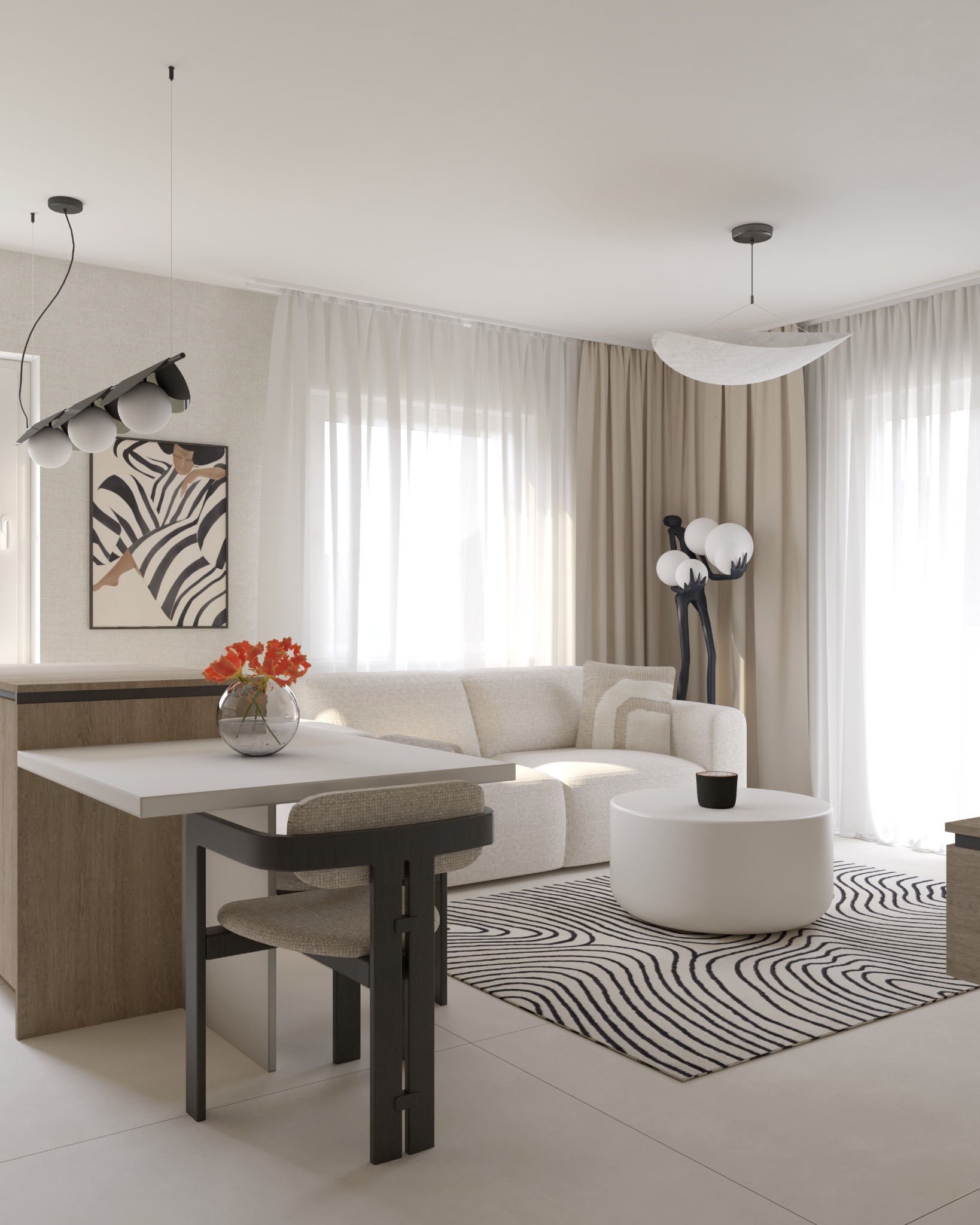 Jasne wnętrze mieszkania z aneksem kuchennym, białym stołem i krzesłem o ciemnej konstrukcji, sofa z poduszką, okrągły stolik kawowy, wzorzysty dywan, lampa stojąca z kulami i obraz w paski...