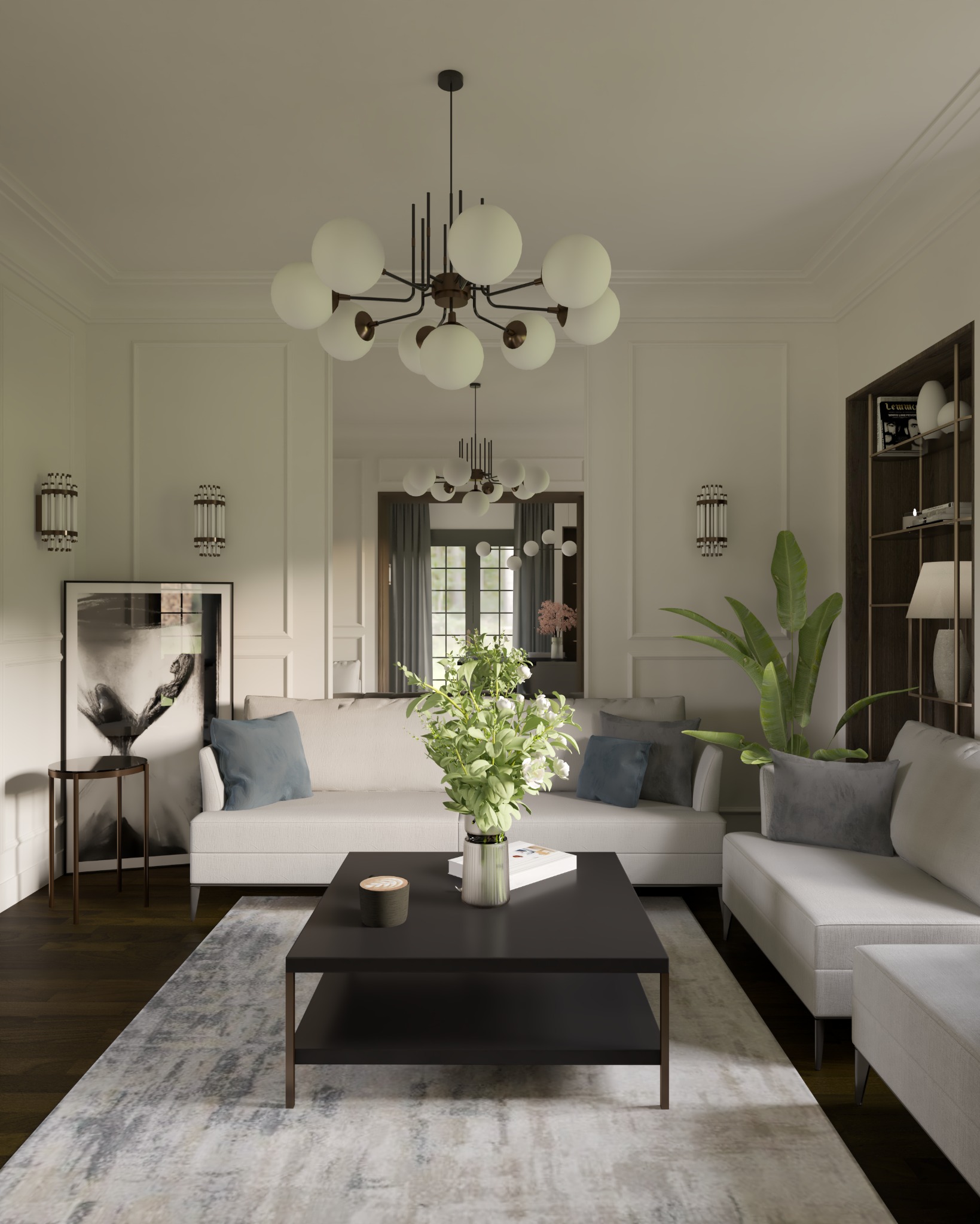 Jasny salon z sofą modułową, ciemnym stolikiem kawowym z dekoracjami, wzorzystym dywanem i roślinami doniczkowymi, oświetlony nowoczesnym żyrandolem kulistym.