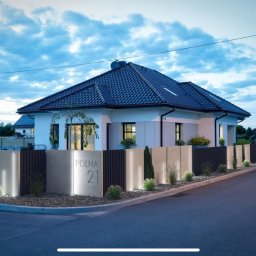 Bitisad - Nowoczesny dom jednorodzinny z podświetlonym ogrodzeniem z elementami betonowymi i metalowymi, ozdobiony niskimi krzewami i małymi drzewkami, widoczny z ulicy o zmierzchu.