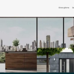 Perfectpixel - Strona internetowa firmy 'Stylowa Panorama' z widokiem na panoramę miasta w tle, prezentująca nowoczesne wnętrza i wejście do budynku.