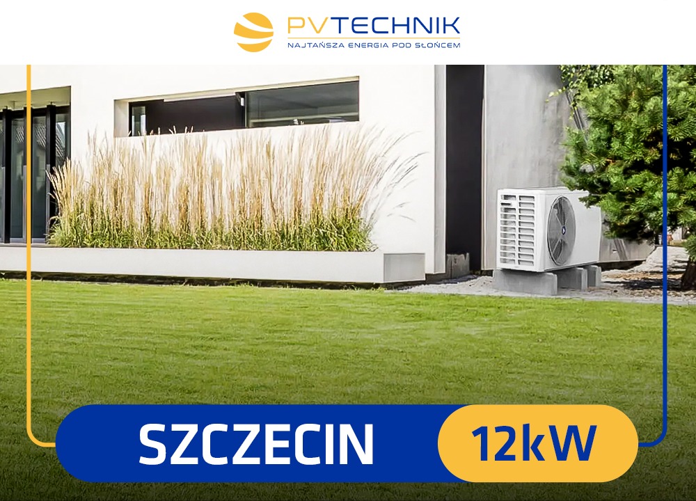 Biała jednostka zewnętrzna na betonowych podstawach przy ścianie nowoczesnego domu z ozdobną trawą w donicy, na tle zielonego trawnika.