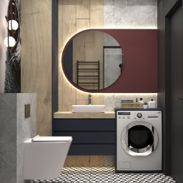 Gawron Studio Design - Nowoczesna łazienka z okrągłym lustrem podświetlanym LED, wiszącą toaletą, pralką i geometryczną posadzką w czarno-białą szachownicę.