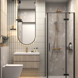 Gawron Studio Design - Wizualizacja łazienki z kabiną prysznicową z czarnymi ramami, umywalką z szafką z drewnopodobnym wykończeniem, owalnym lustrem z podświetleniem LED i złotą armaturą.