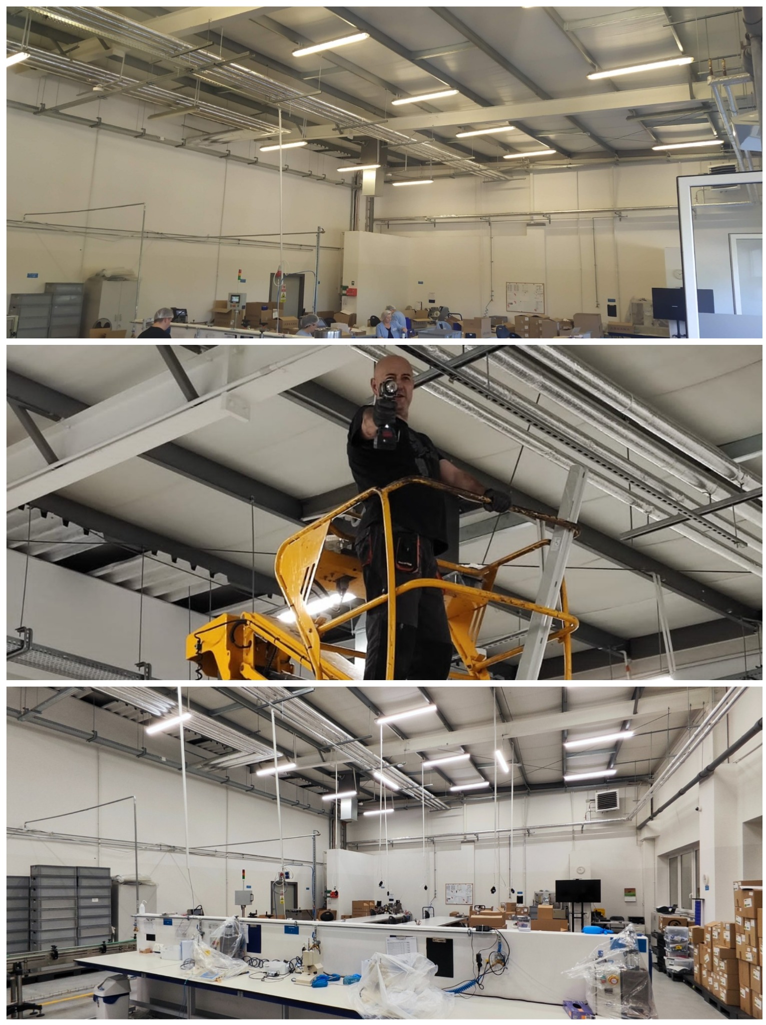 Elektryk z Wrocławia na podnośniku montuje koryto kablowe pod sufitem w hali produkcyjnej, widoczne rury i lampy.