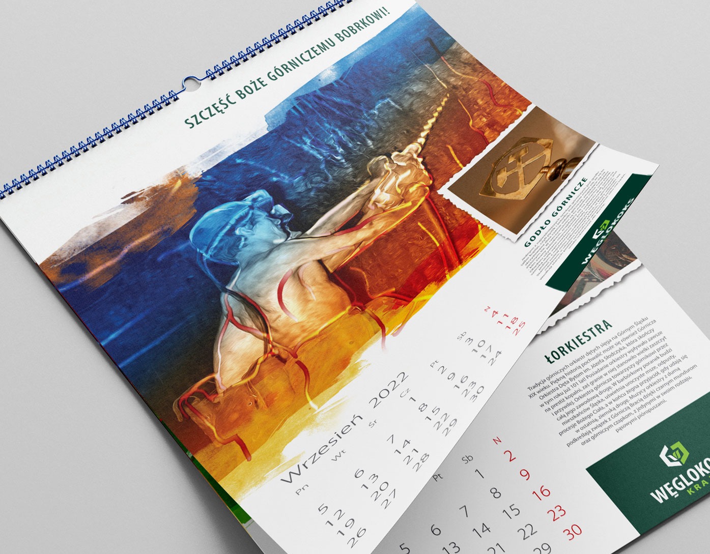Kalendarz firmowy na wrzesień 2022 z motywem górniczym: artystyczna ilustracja górnika, godło górnicze, informacje o orkiestrze dętej i logo firmy WĘGLOKOKS.