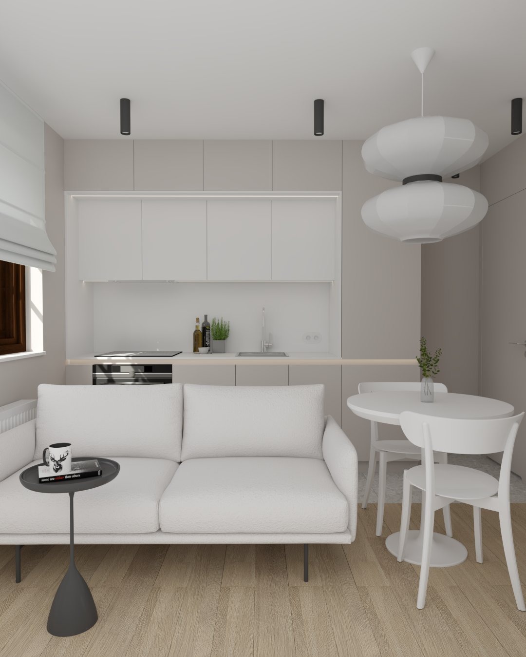 Wizualizacja wnętrza: jasna kuchnia z sofą, okrągłym stołem i minimalistycznym oświetleniem. Na stole książka i kubek z motywem jelenia.