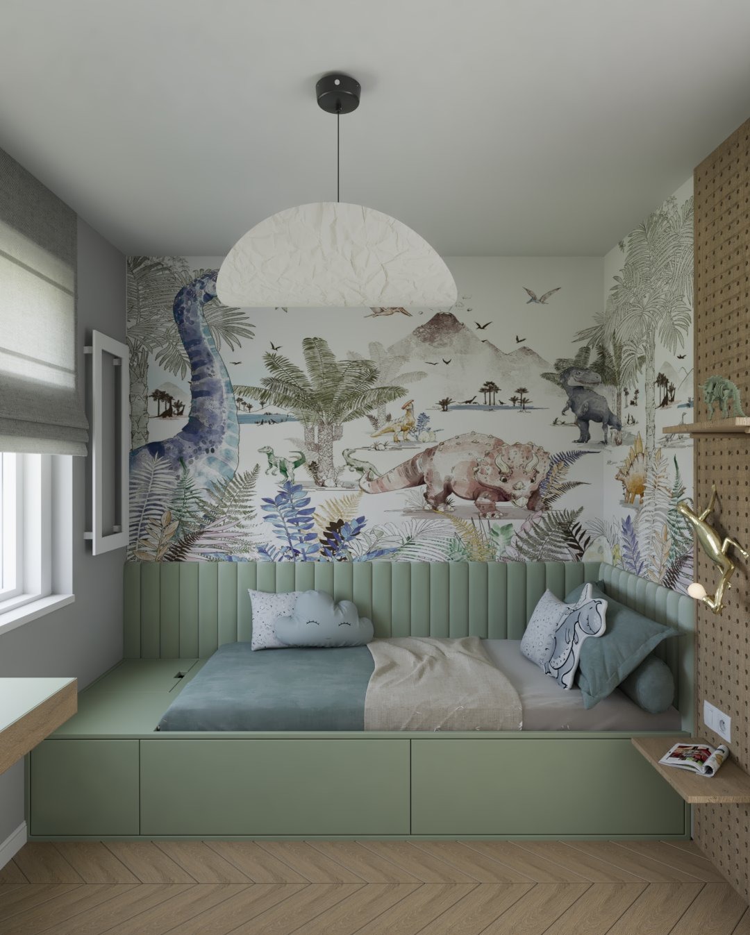 Pokój dziecięcy z motywem dinozaurów na tapecie, zielonym łóżkiem z pojemnikami i lampą w kształcie półksiężyca. Przytulne i funkcjonalne wnętrze.