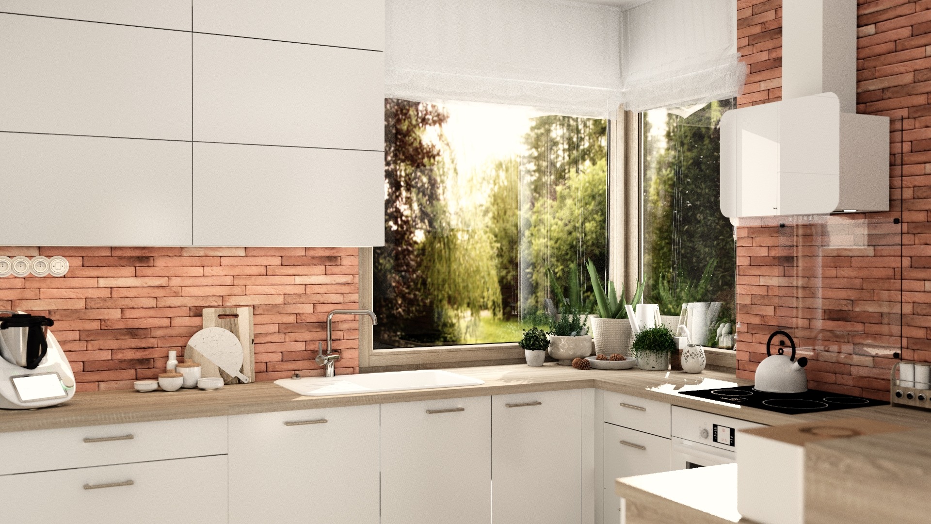 Jasna kuchnia z białymi szafkami, ceglaną ścianą nad blatem, widokiem na zieleń za oknem i robotem kuchennym Thermomix na blacie.