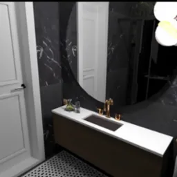 Wizualizacja łazienki z umywalką nablatową, złotą armaturą i okrągłym lustrem na tle marmurowej ściany, widoczna butelka perfum i dozownik mydła.