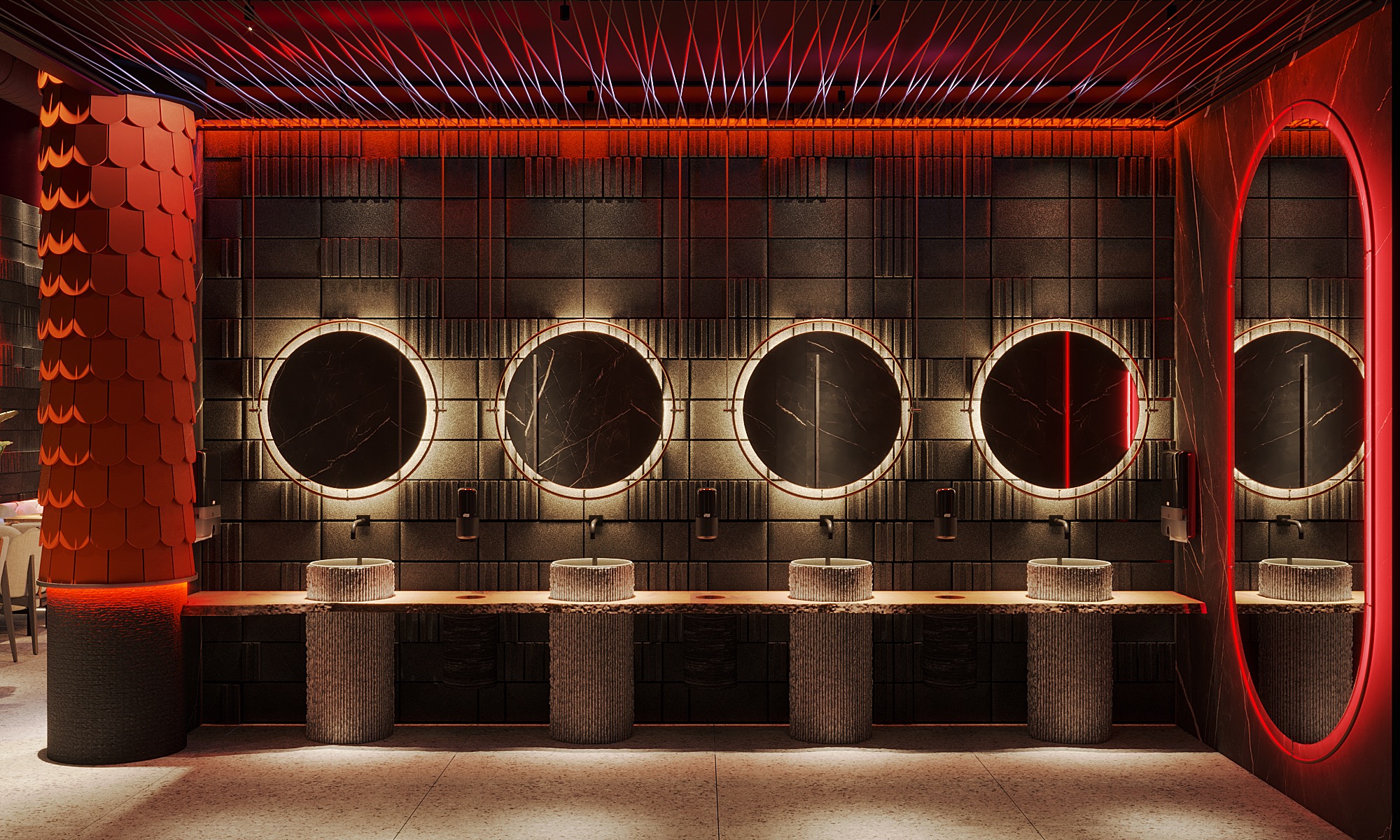 Nowoczesna łazienka publiczna z czterema okrągłymi lustrami podświetlonymi LED, umywalkami na postumentach z teksturą, czarnymi płytkami na ścianach i czerwonym oświetleniem sufitowym.
