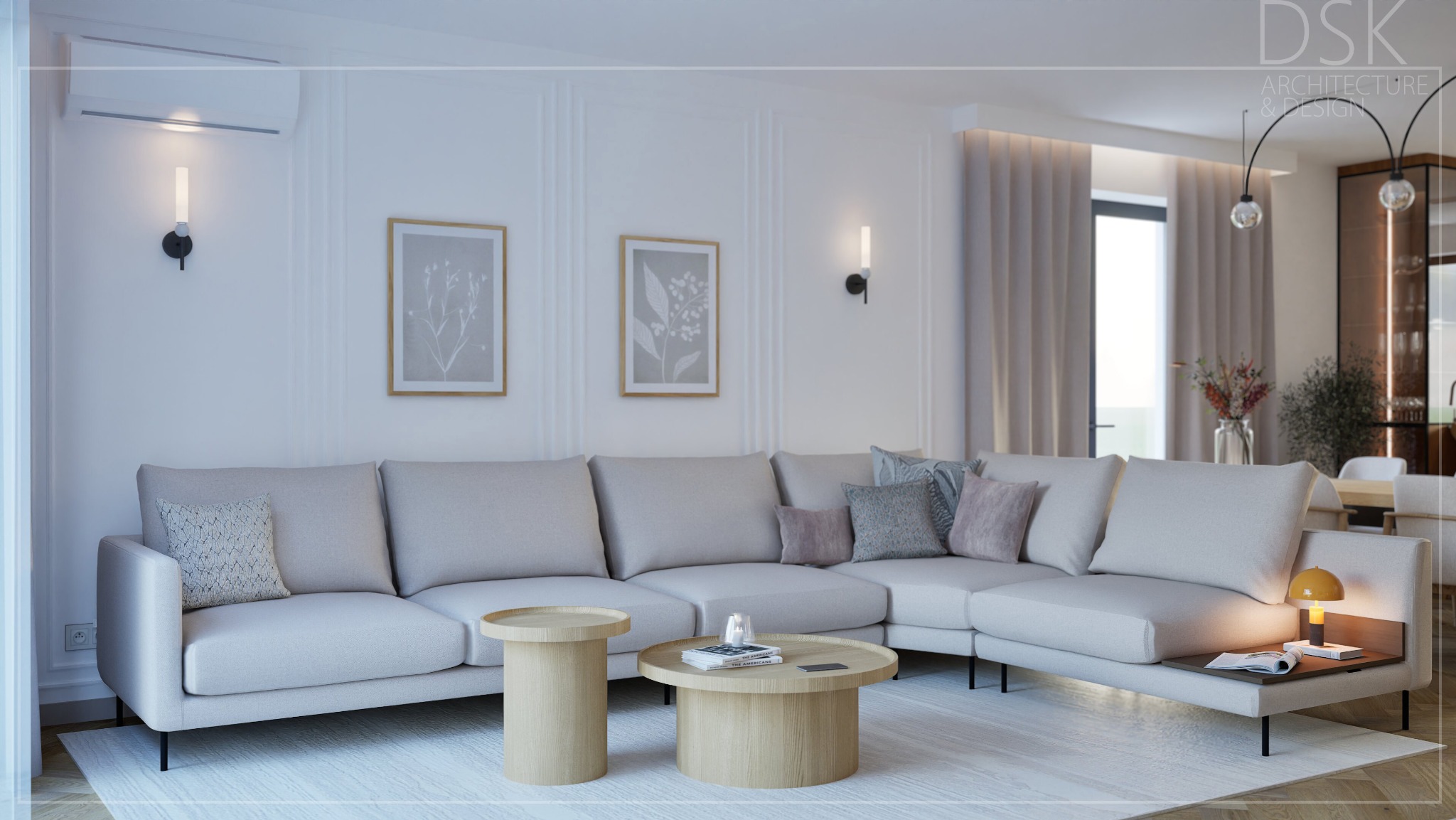 Jasny salon z narożną sofą, okrągłymi stolikami kawowymi i minimalistycznymi dekoracjami ściennymi. Subtelne oświetlenie i neutralna kolorystyka tworzą przytulną atmosferę.