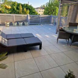 COMEX SPÓŁKA Z OGRANICZONĄ ODPOWIEDZIALNOŚCIĄ - Realizacja tarasu na systemie z płytkami Italgraniti.