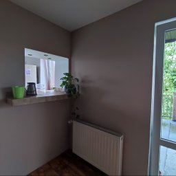 Usuniecie poprzedniej pokrywy, kladzenie gladzi i malowanie