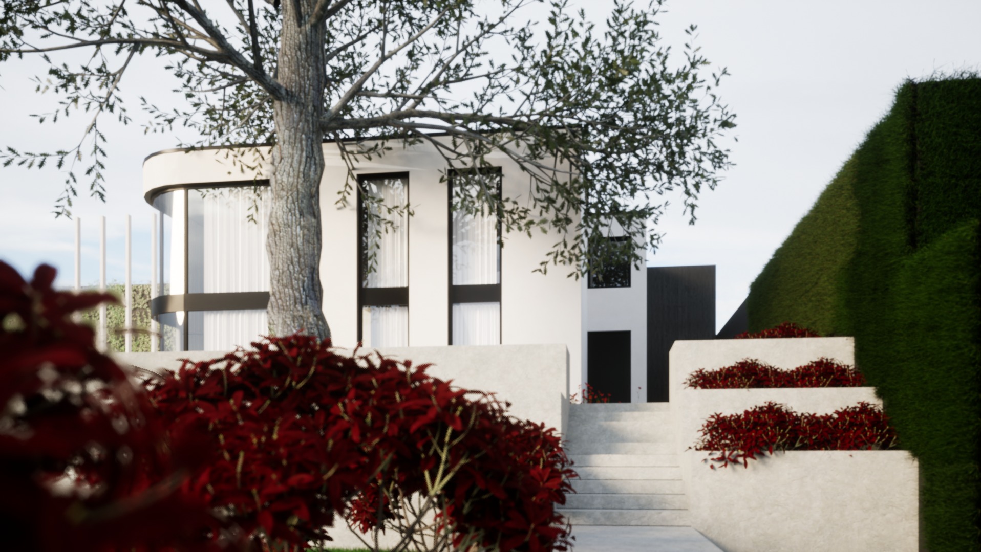 Nowoczesny dom z białymi ścianami i czarnymi ramami okiennymi, otoczony zielenią i czerwonymi krzewami, widok z poziomu gruntu.