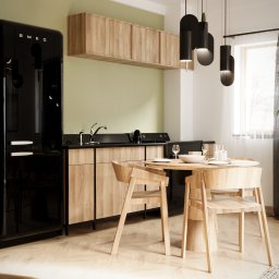 NAVRO. - Studio Projektowe - mgr inż. arch. Piotr Nawrocki - Nowoczesna kuchnia z czarną lodówką SMEG, drewnianymi szafkami i okrągłym stołem z jasnymi krzesłami, oświetlona wiszącymi lampami w kształcie walców.