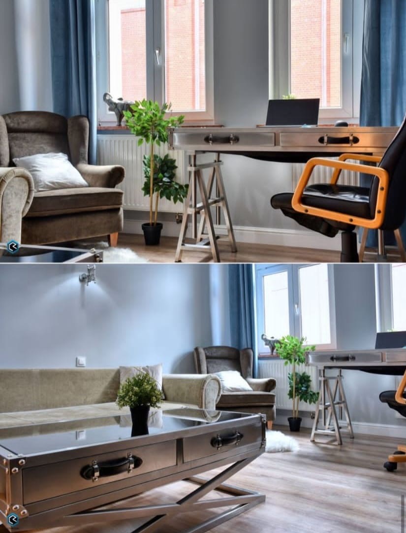 Nowoczesne wnętrze biura z metalowym biurkiem na kozłach, fotelem, kanapą i stolikiem kawowym w stylu industrialnym, oświetlone naturalnym światłem z okna.