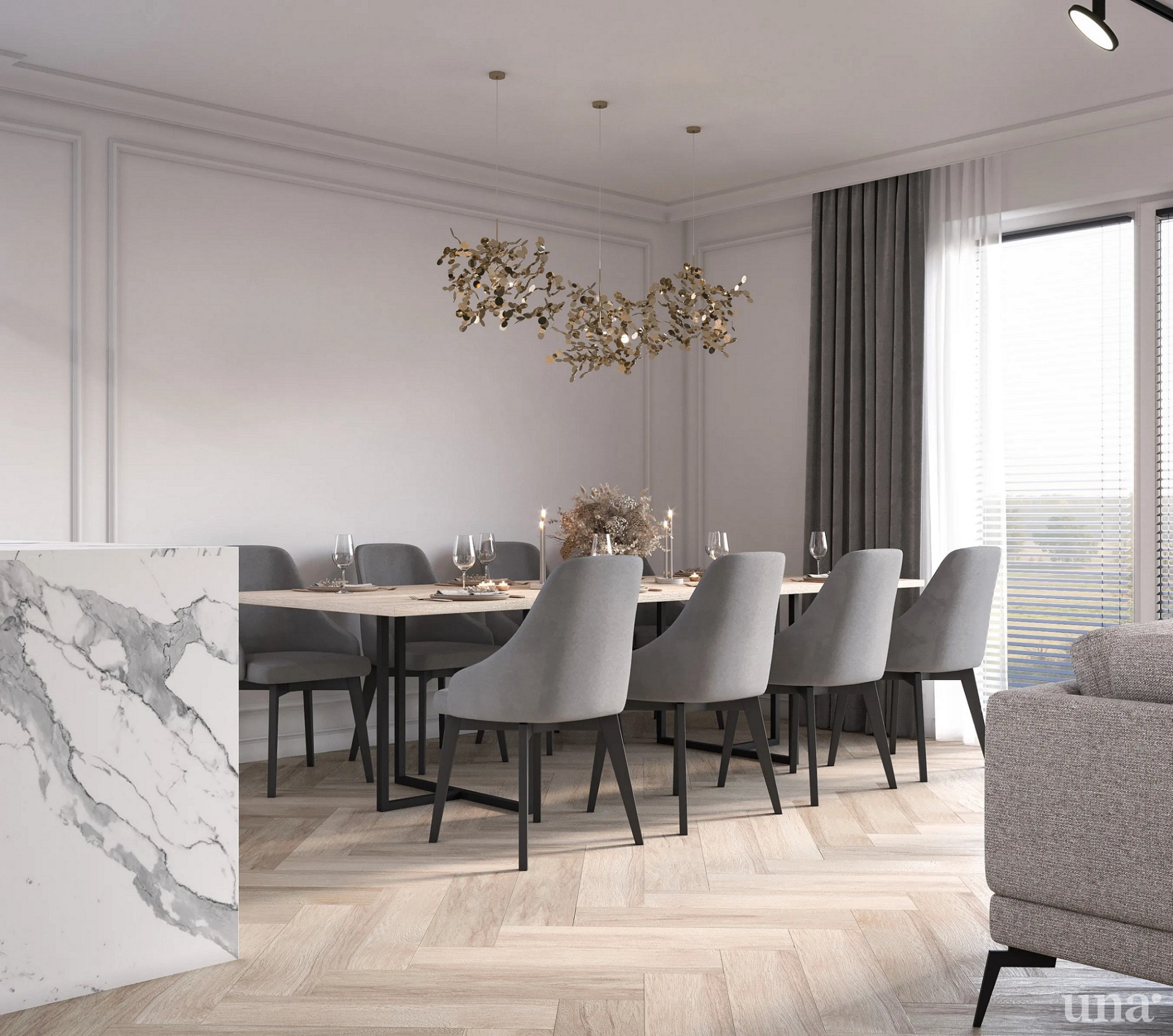 Nowoczesna jadalnia z drewnianą podłogą w jodełkę, szarymi krzesłami tapicerowanymi, stołem z czarnymi nogami, dekoracyjnym złotym żyrandolem i marmurowym blatem wyspy kuchennej.