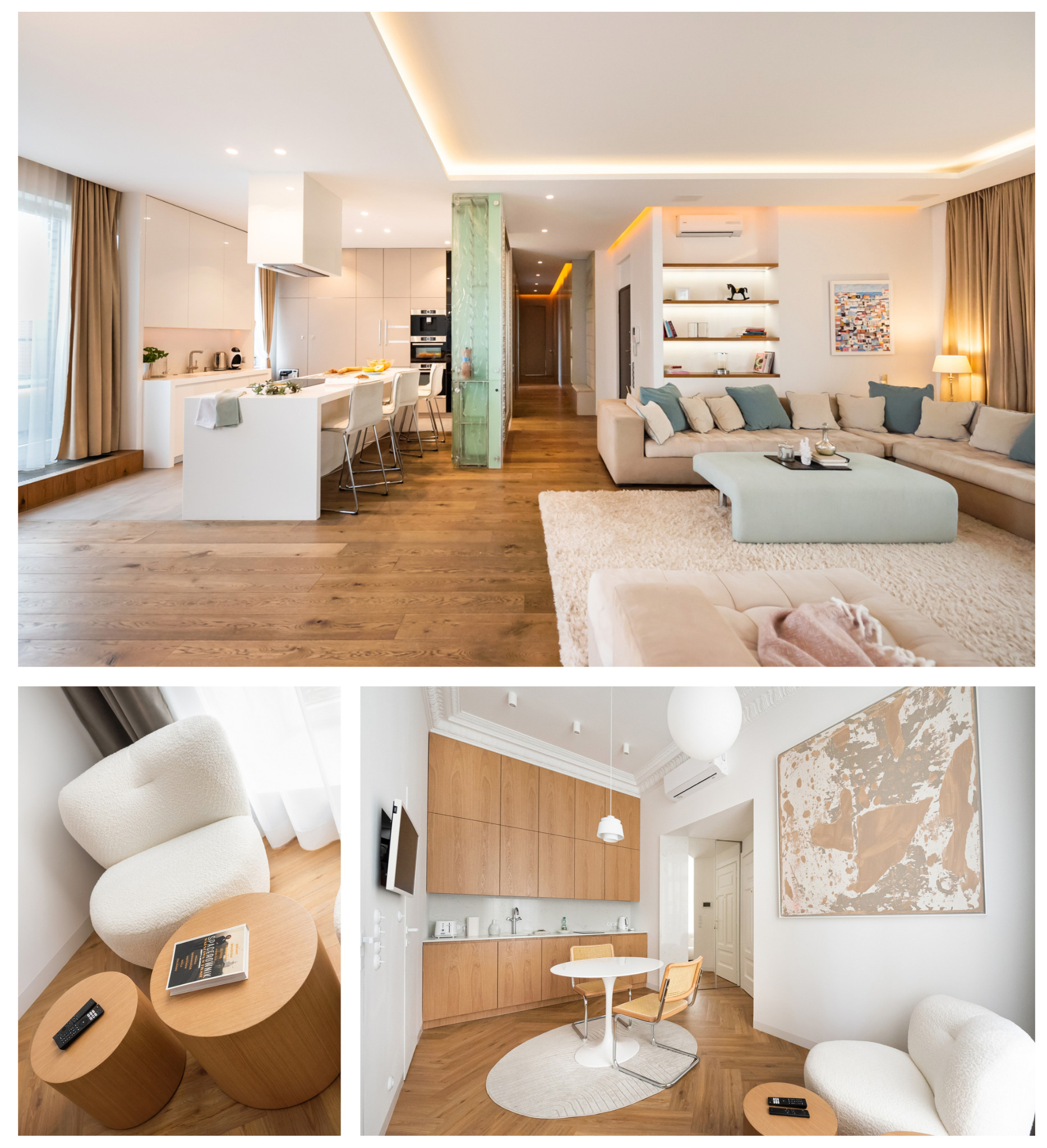 Jasne, przestronne wnętrze apartamentu z otwartą kuchnią, salonem i jadalnią; drewniana podłoga, białe meble kuchenne, beżowa sofa z turkusowymi poduszkami, okrągły stolik kawowy z pilotem i książką.