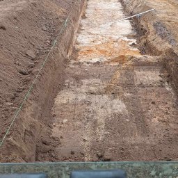 Maciej Wojdyr usługi budowlane - Wykop pod fundament ścian oporowych L